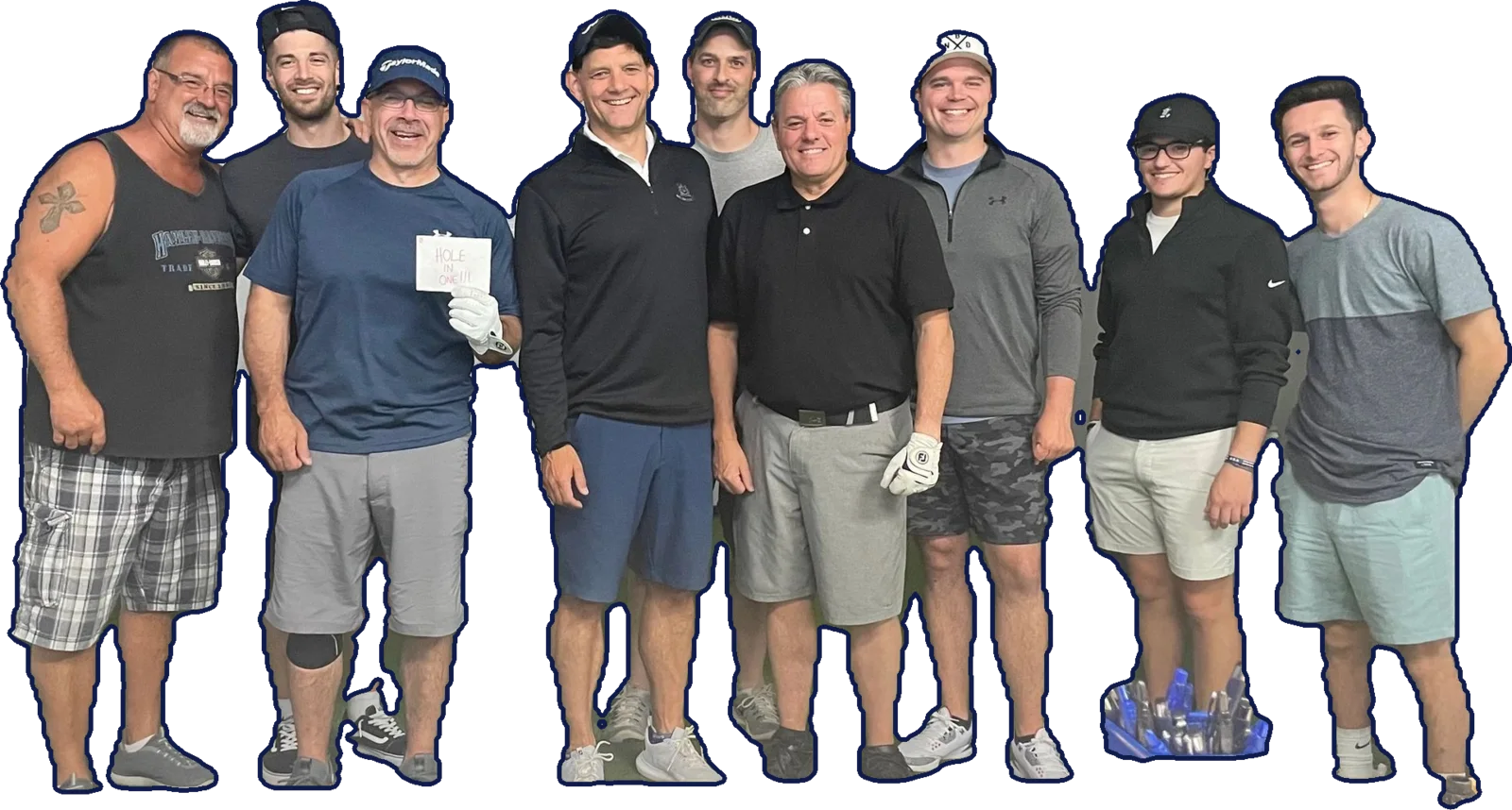 Nine league golfers cut out of their photo and standing on the pixel-art fairway. One holds a handwritten card that reads HOLE IN ONE!!!